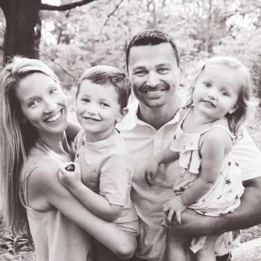Dr. Zachary Langgle, D.C. with his wife Adrienne and family - Lead Chiropractor at Prime Health + Wellness Downers Grove